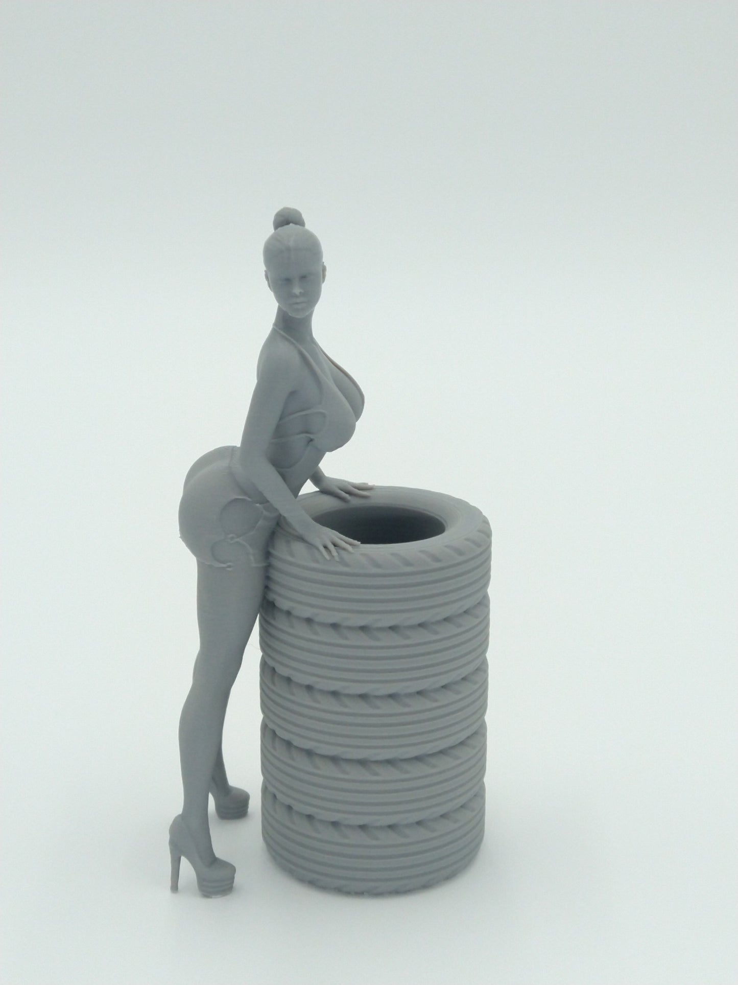 Sexy Bikini Girl Posing on Tires Pen Holder 5.5" Gray 3d printed
