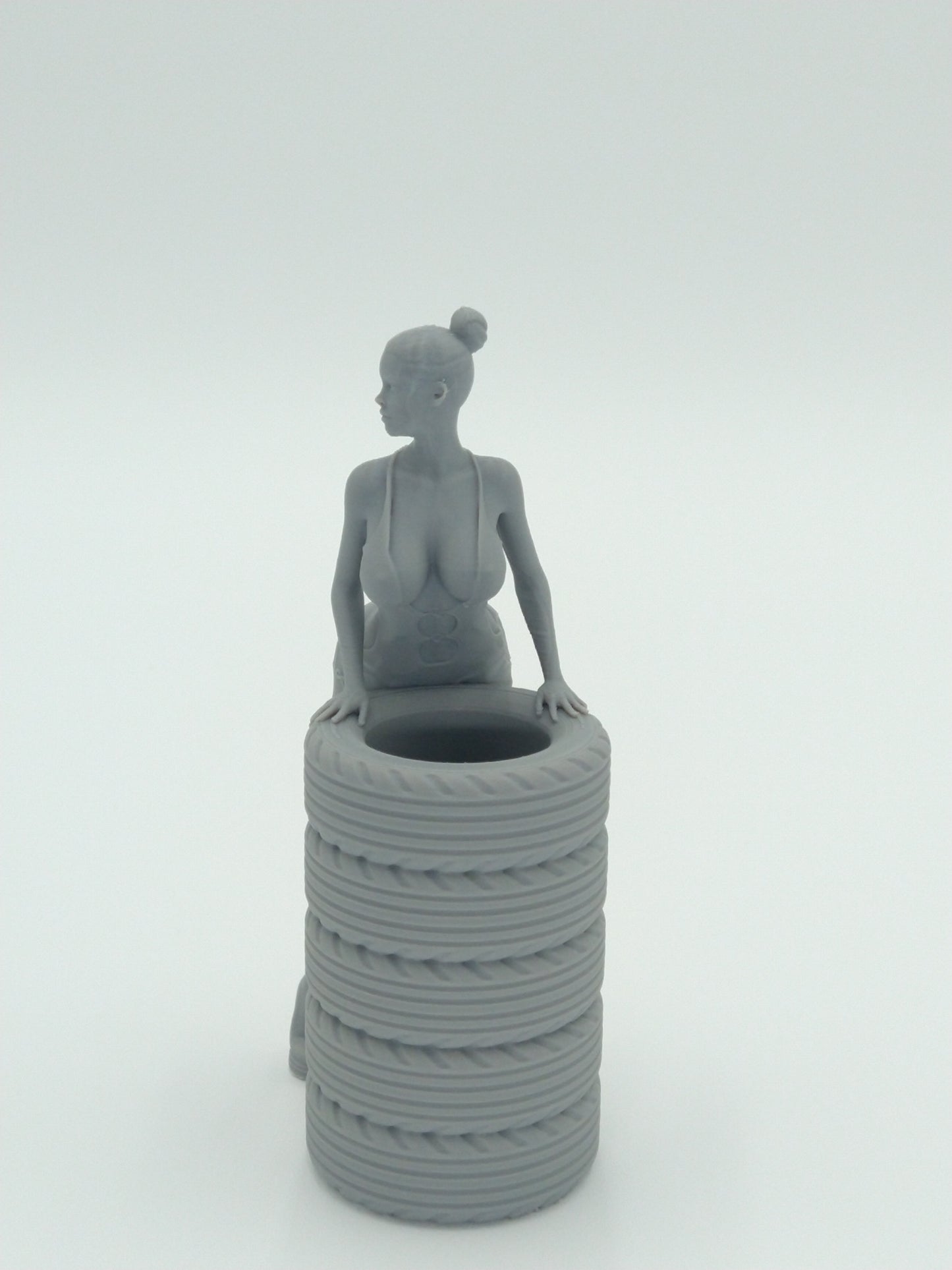 Sexy Bikini Girl Posing on Tires Pen Holder 5.5" Gray 3d printed