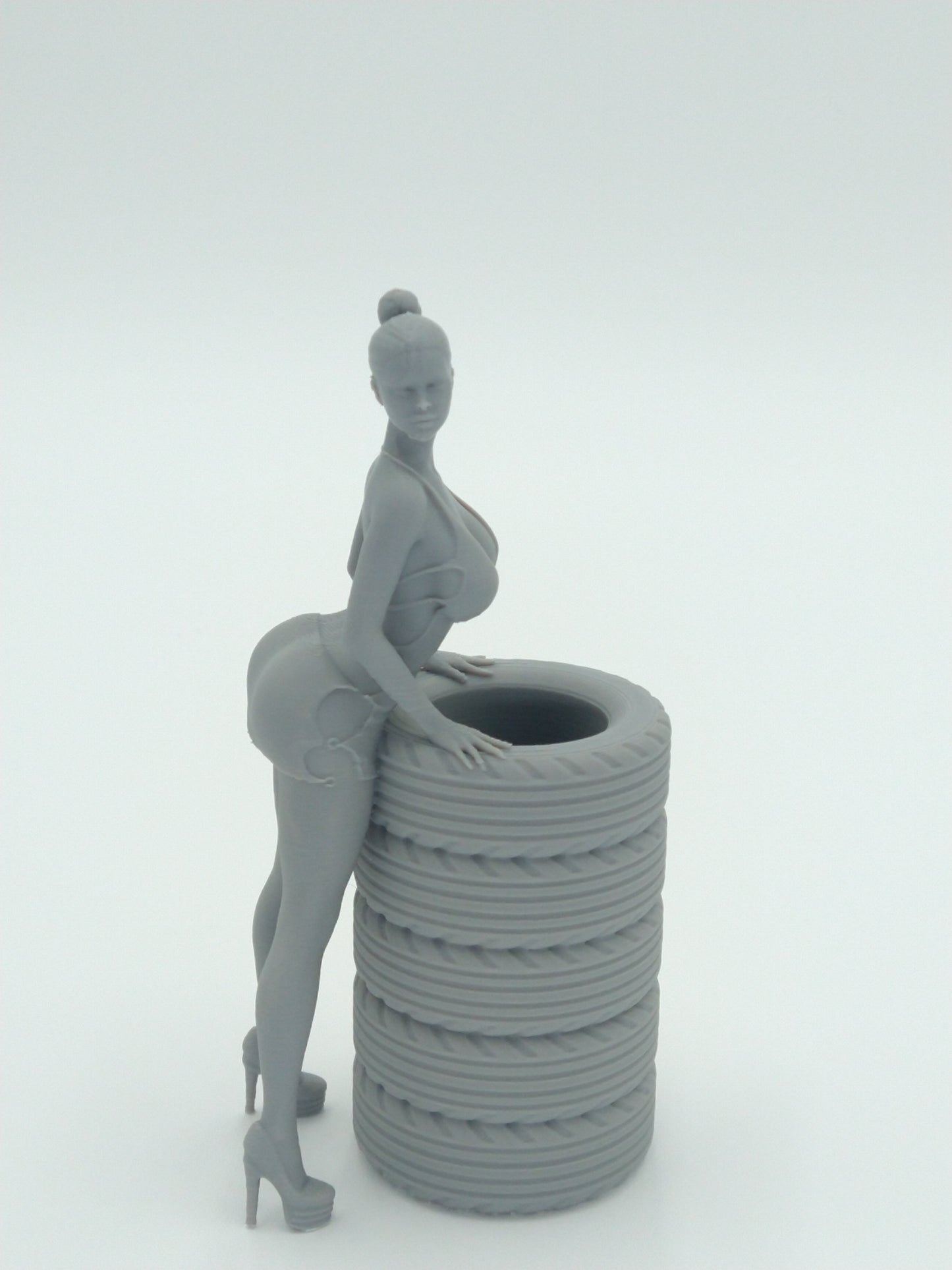 Sexy Bikini Girl Posing on Tires Pen Holder 5.5" Gray 3d printed